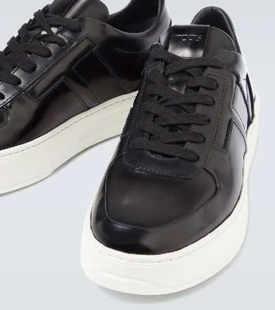 Shop Tod's Spazzolato Leather Sneakers In Black
