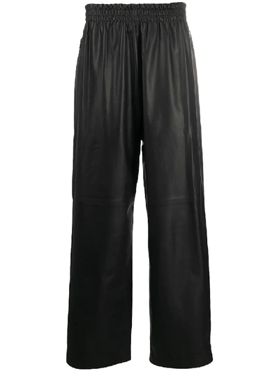Shop Bottega Veneta Leather Tapered Trousers In Black
