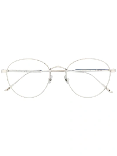 Shop Cartier Round-frame Glasses In Silver
