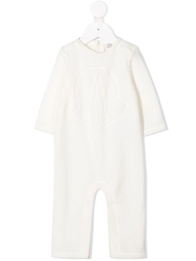 Shop Moncler Embossed Logo Romper In White