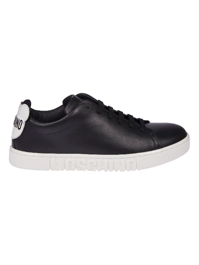 Shop Moschino Rear Logo Patched Sneakers In Black/white