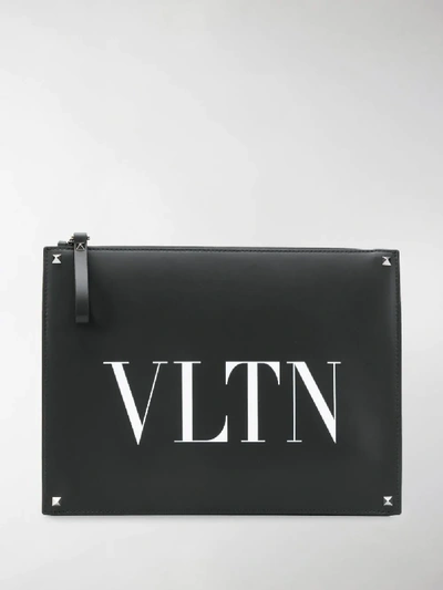 Shop Valentino Vltn Rockstud Clutch In Black