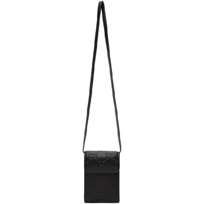 Shop Gucci Black Mini Gg Embossed Bag In 1000 Black