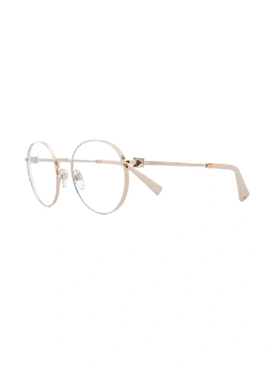Shop Valentino Round Frame Glasses In Neutrals