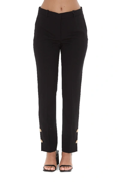 Shop Versace Pants In Black