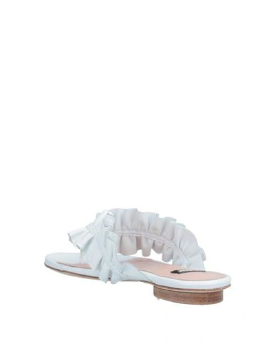 Shop Boutique Moschino Flip Flops In White