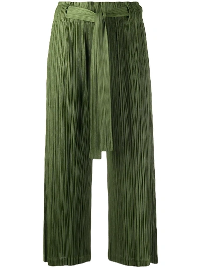 Shop Issey Miyake Cropped Pleated Trousers In Green