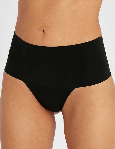 Shop Spanx Undie-tectable High-rise Jersey Thong In Black