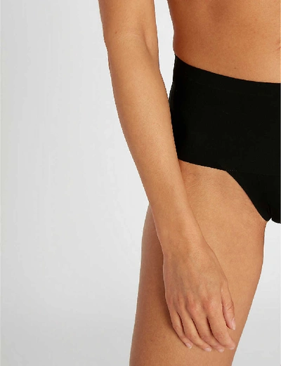 Shop Spanx Undie-tectable High-rise Jersey Thong In Black