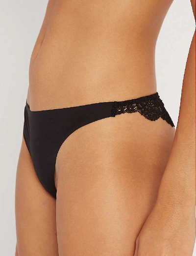 Shop Stella Mccartney Stella Smooth And Lace Stretch-jersey And Lace Thong In Black