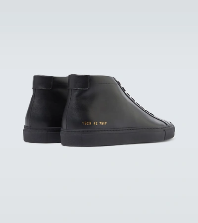 Shop Common Projects Original Achilles Mid Sneakers In Black