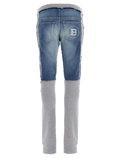 Shop Balmain Jersey Insert Jeans In Multi