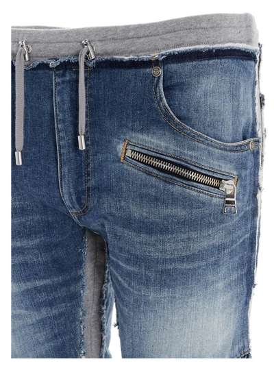 Shop Balmain Jersey Insert Jeans In Multi
