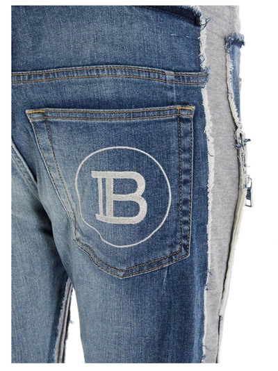 Shop Balmain Jersey Insert Jeans In Multi