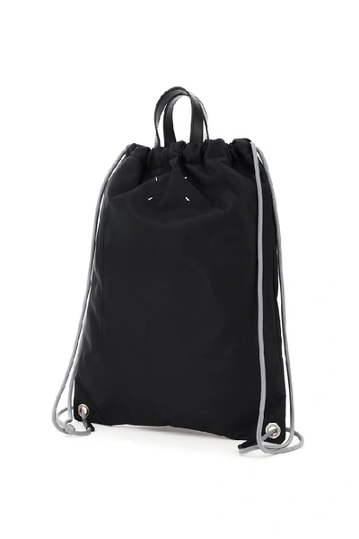 Shop Maison Margiela Logo Drawstring Backpack In Black