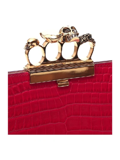 Shop Alexander Mcqueen Four Ring Clutch Bag In Red