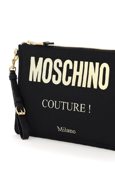 Shop Moschino Couture Logo Clutch Bag In Black