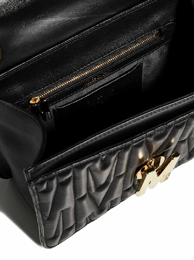 Shop Moschino M Quilted Logo Shoulder Bag In Black