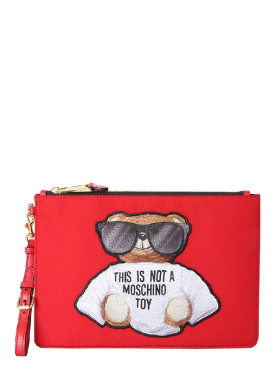 Shop Moschino Teddy Clutch Bag In Red