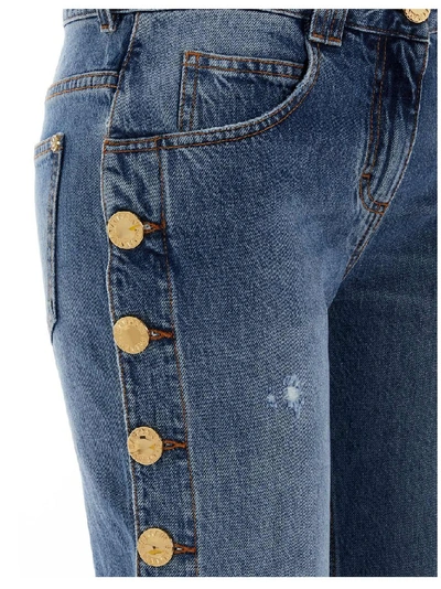 Shop Balmain Buttoned Jeans In Blue