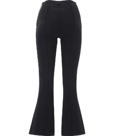 Shop Givenchy Chain Flared Trousers In Black