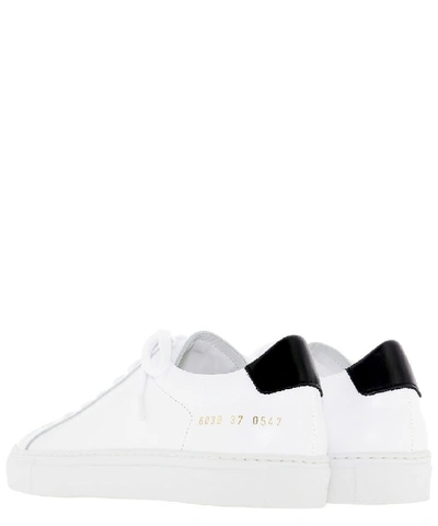 Shop Common Projects Retro Low Sneakers In White