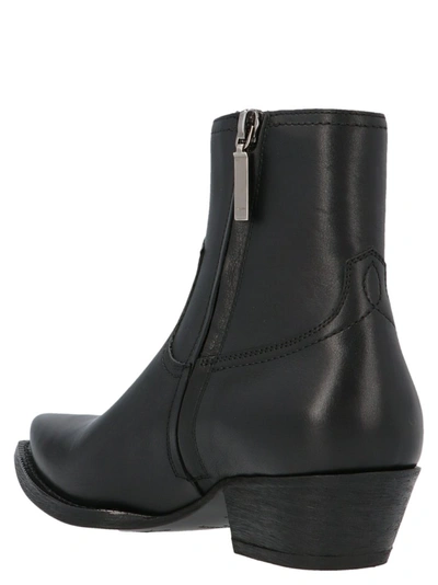 Shop Saint Laurent Lukas Ankle Boots In Black