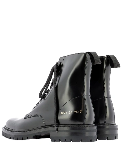 Shop Common Projects Combat Boots In Black