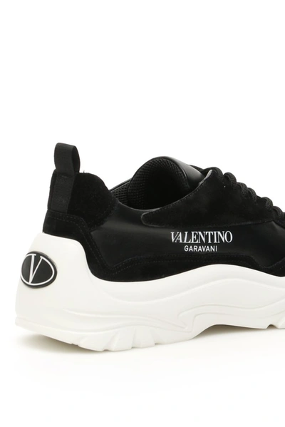 Shop Valentino Garavani Gumboy Sneakers In Black