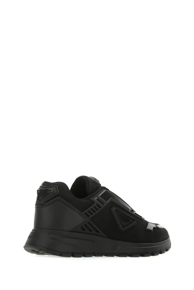 Shop Prada New Prax Sneakers In Black
