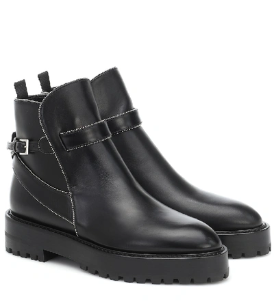 Shop Alaïa Leather Ankle Boots In Black