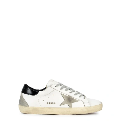 Shop Golden Goose Superstar Distressed Leather Sneakers In White And Black
