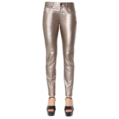 Shop Saint Laurent Women's Gold Leather Pants