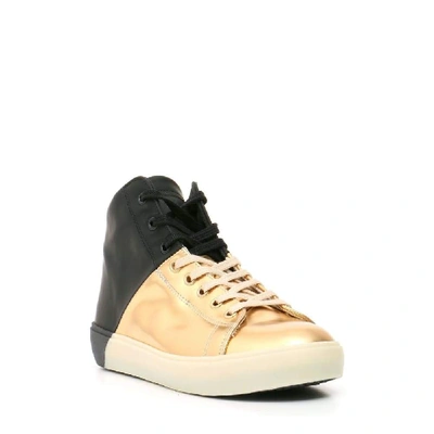 Shop Leather Crown Women's Gold Leather Hi Top Sneakers