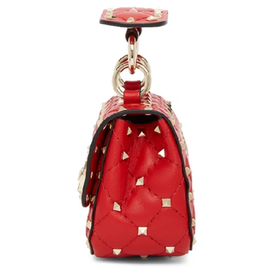 Shop Valentino Red  Garavani Micro Rockstud Spike Bag In Ju5 Redpur