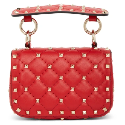 Shop Valentino Red  Garavani Micro Rockstud Spike Bag In Ju5 Redpur