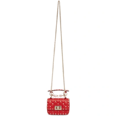 Shop Valentino Red  Garavani Micro Rockstud Spike Bag In Ju5 Redpur