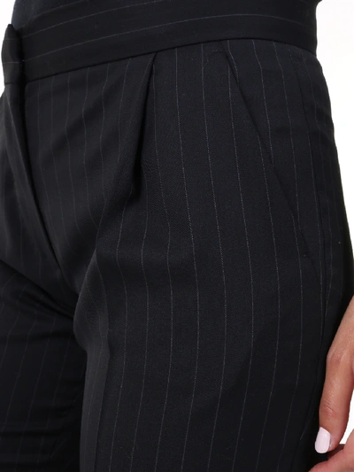 Shop Max Mara Pinstripe Trousers In Black