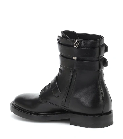 Shop Saint Laurent Army Leather Ankle Boots In Black