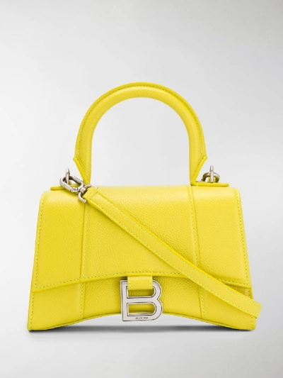 Shop Balenciaga Mini Hourglass Crossbody Bag In Yellow
