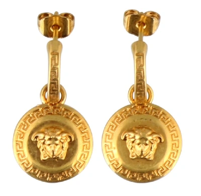 Shop Versace Medusa Earrings In Gold