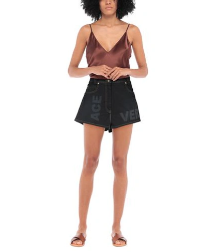 Shop Versace Denim Shorts In Black