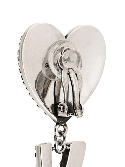 Shop Saint Laurent Ysl Heart Earrings In Silver