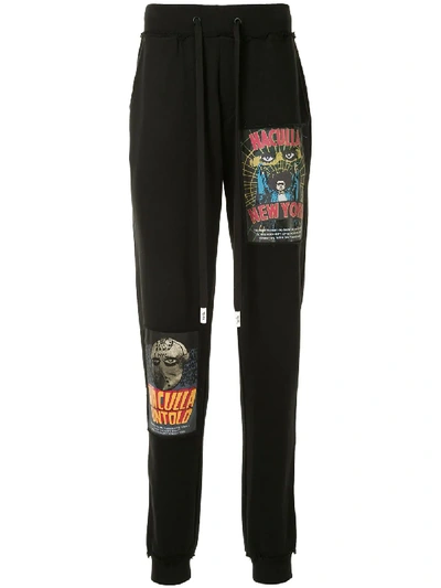 Shop Haculla Movie Poster Print Track Trousers In Black