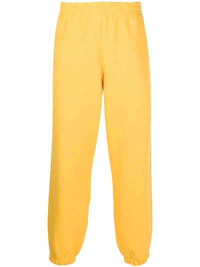Shop Adidas Originals By Pharrell Williams Track Pants In Yellow
