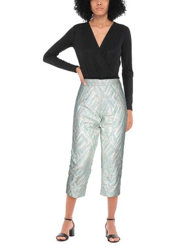 Shop Moschino Cropped Pants In Light Green