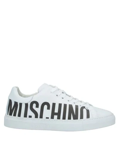 Shop Moschino Sneakers In White