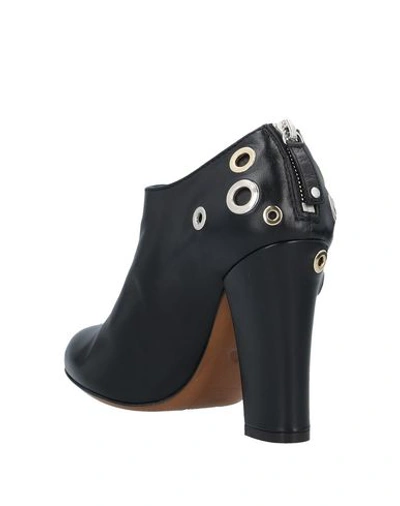 Shop Moschino Cheap And Chic Ankle Boot In Black