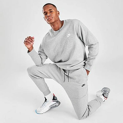 Shop Nike Tech Fleece Taped Jogger Pants In Dark Grey Heather/black