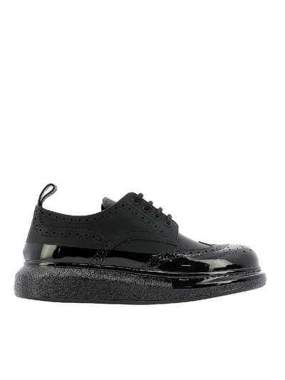 Shop Alexander Mcqueen Hybrid Leather Lace-up In Black